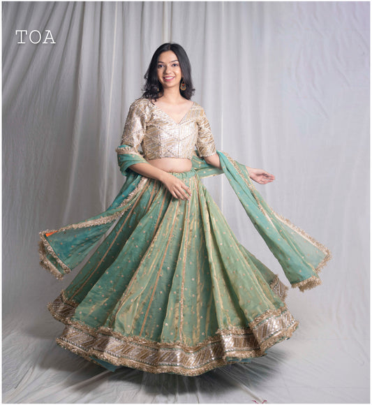 “Swarnika” – Kanjivaram Tissue Silk Skirt Set