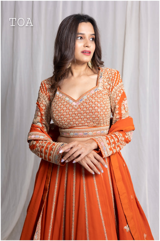 Introducing our Beautiful Rust Lehenga Set